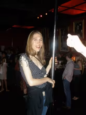 Katelin Zaslow with a stripper pole
